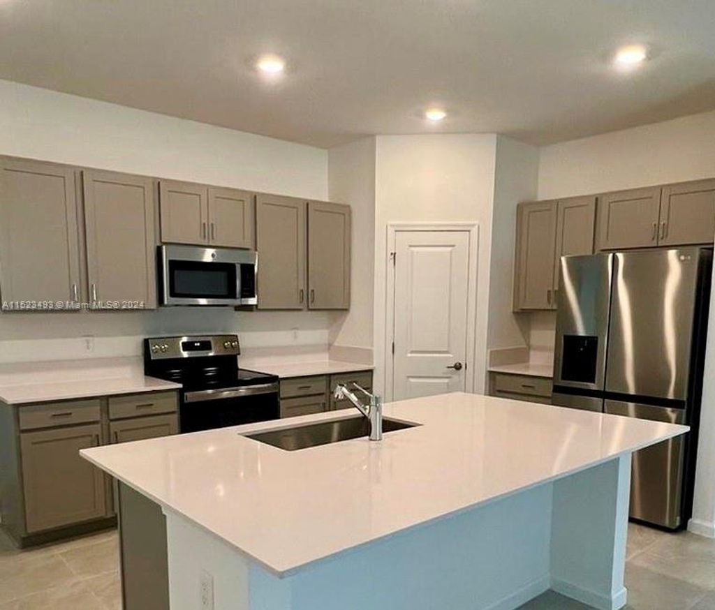 Photo of 974 Bent Creek Dr, Fort Pierce, FL 34947 (MLS # A11523493)