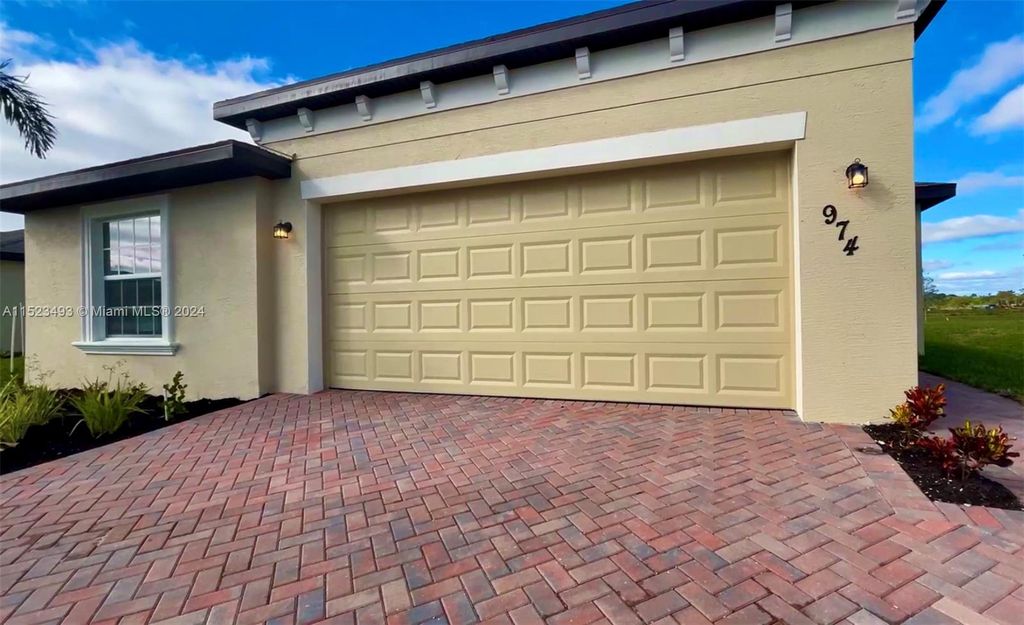 Photo of 974 Bent Creek Dr, Fort Pierce, FL 34947 (MLS # A11523493)