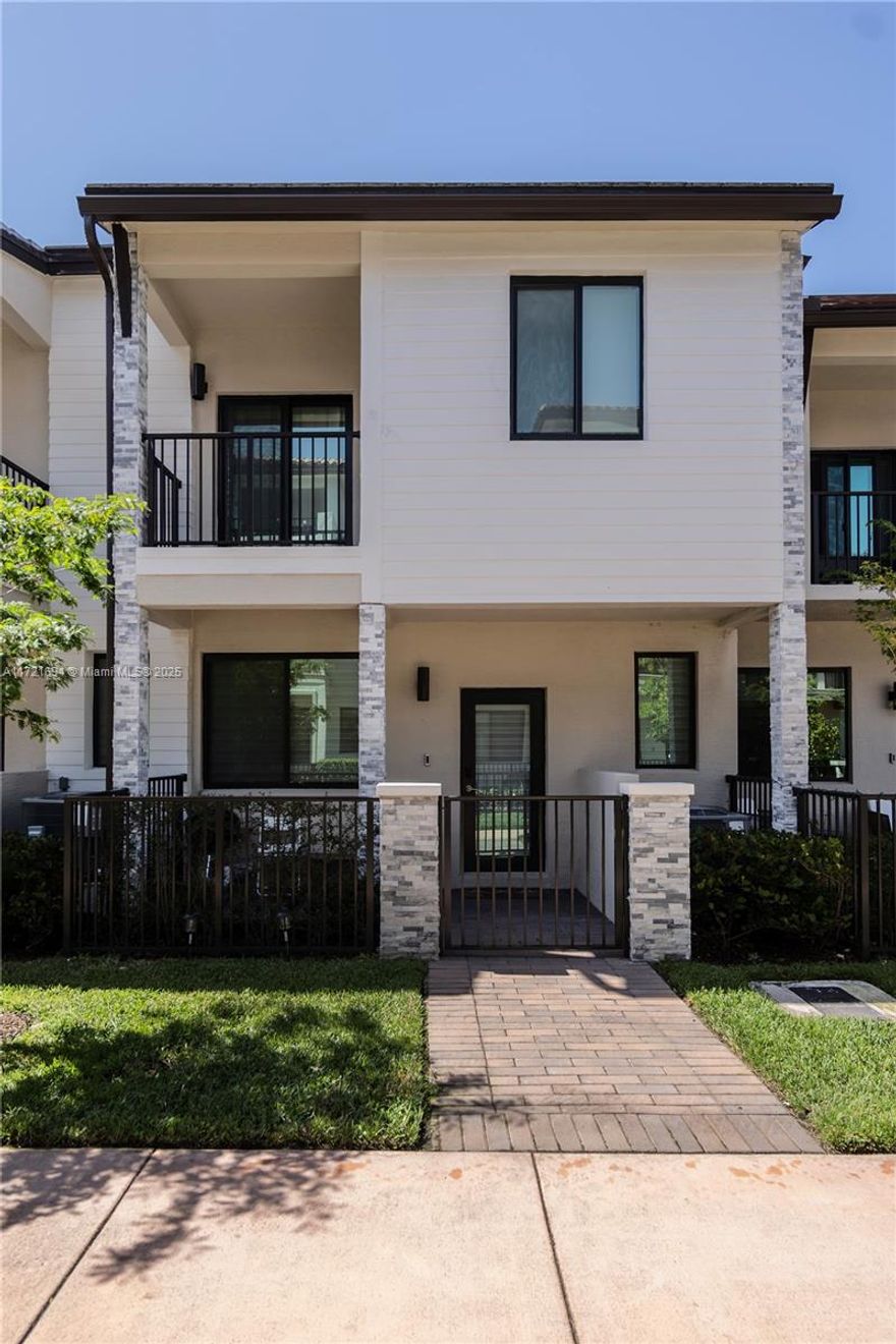 Currently Lease until August 2026. Stunning 2022 townhome in Doral! With 4 bedrooms, 2.5 bathrooms, and 1,652 sqft of elegant space, this home offers modern comfort and style. Enjoy an open-concept design, high-end finishes, and a community pool just steps away. Located near A+ schools, shopping, and dining, this residence blends sophistication with convenience. Experience the best of both worlds in this exceptional home—schedule your tour today!