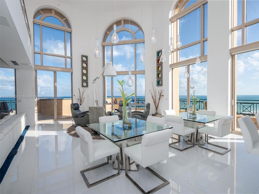 Enjoy beachfront paradise at Villas of Positano! This stunning 2-story penthouse designed by Steven G offers 4,798sf of luxury living. With 4 beds, 3 full baths, 2 half baths, this southeast corner residence is the epitome of costal elegance. The open floor plan with 21' ceilings provides seamless flow between the living spaces, creating  an inviting ambiance. The spacious kitchen is a chef's dream, equipped w/ top of the line appliances & gas cooking. 1,300/sf wrap-around patio offering 270 degrees of breathtaking views of the ocean, Intracoastal, and city skyline. Private elevator. Private 2-car garage w/ plenty of room for storage. Located directly on the Hollywood Beach Broadwalk, you'll have easy access to thew vibrant beachfront scene and a variety of dining/entertainment options.