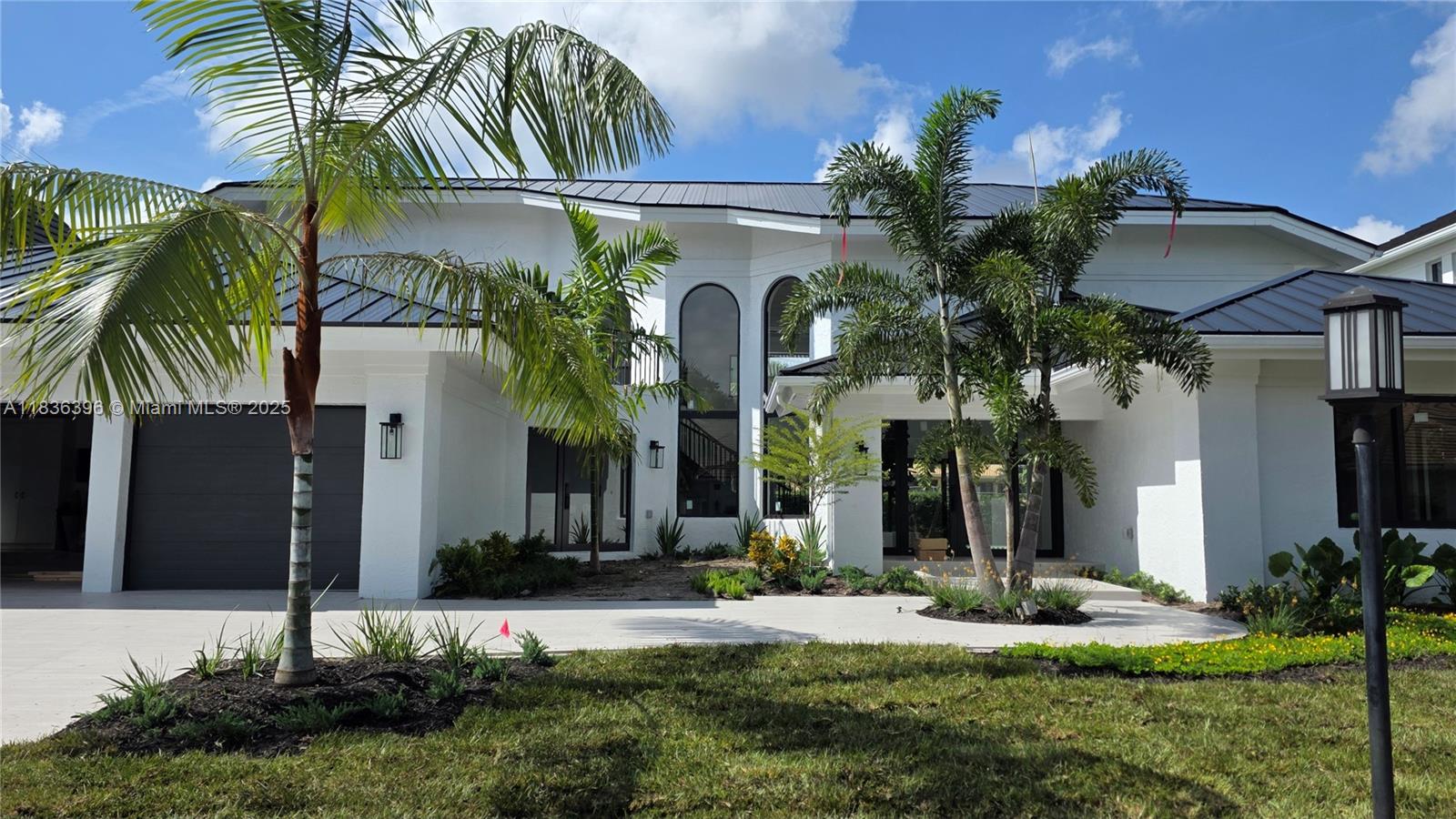 Located in Boca Grove, this charming remodel features a beautiful 16th hole golf course and lake view along with a new metal roof, impact doors, windows, kosher kitchen and a short distance to several religious centers. With 5 bedrooms and 4.5 baths, this home is ideal for those looking for ample space. Come enjoy the lifestyle this community has to offer.