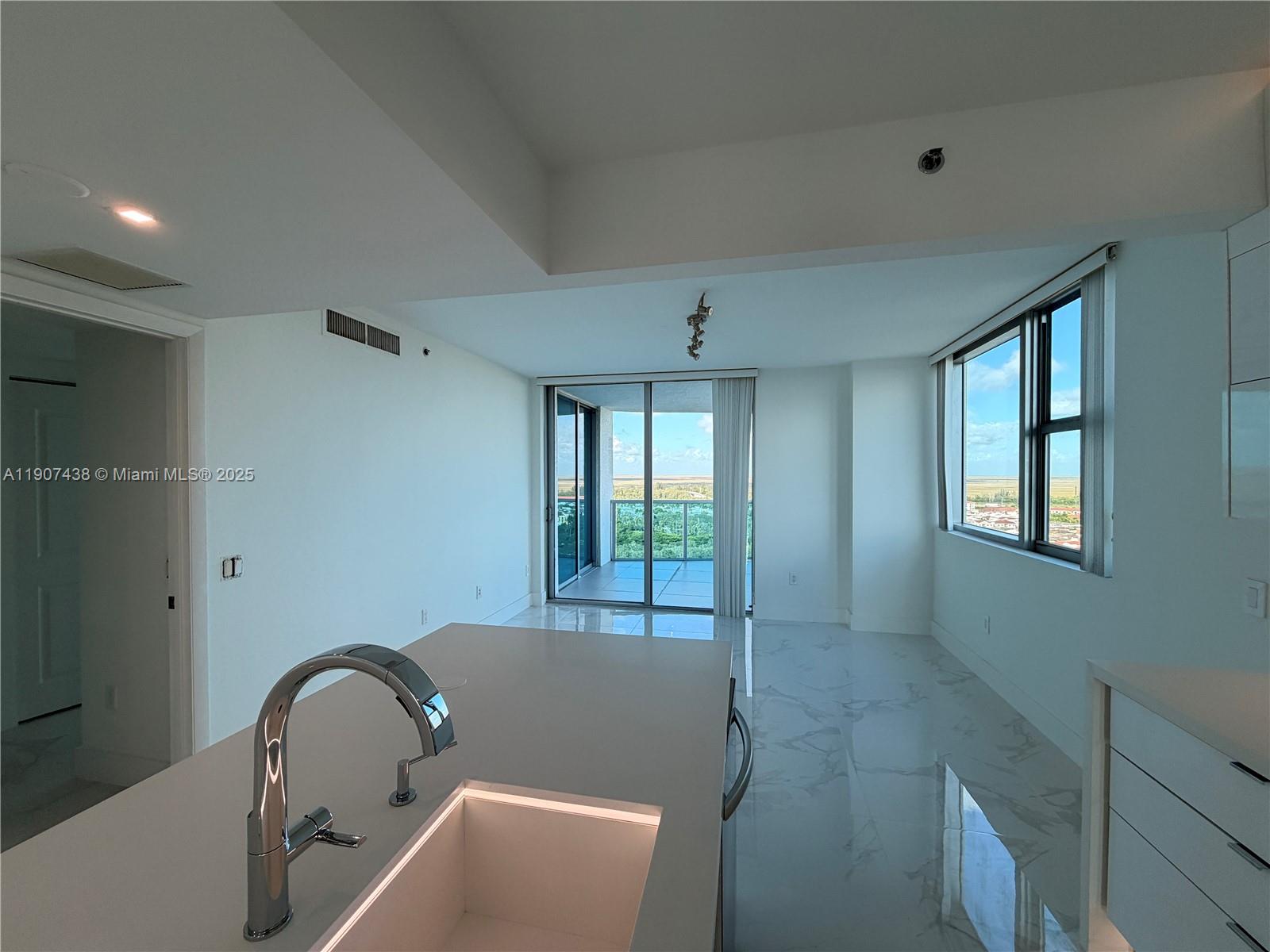 TAO SAWGRASS CONDOMINIUM - Residential