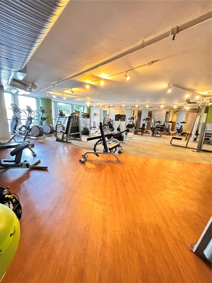 TAO SAWGRASS CONDOMINIUM - Residential