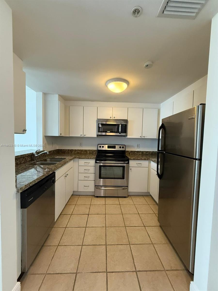 Spacious unit in convenient location near highways and shopping. Laundry inside unit.