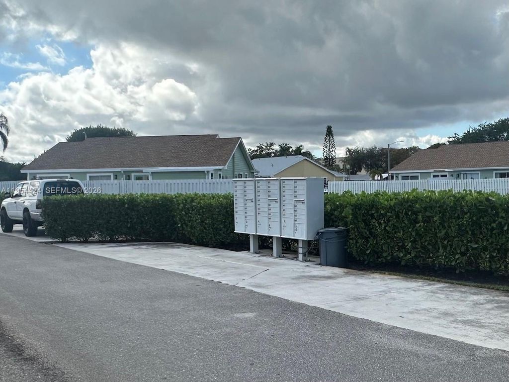 Photo of 1590 Royal Forest Ct, West Palm Beach, FL 33406 (MLS # A11954424)