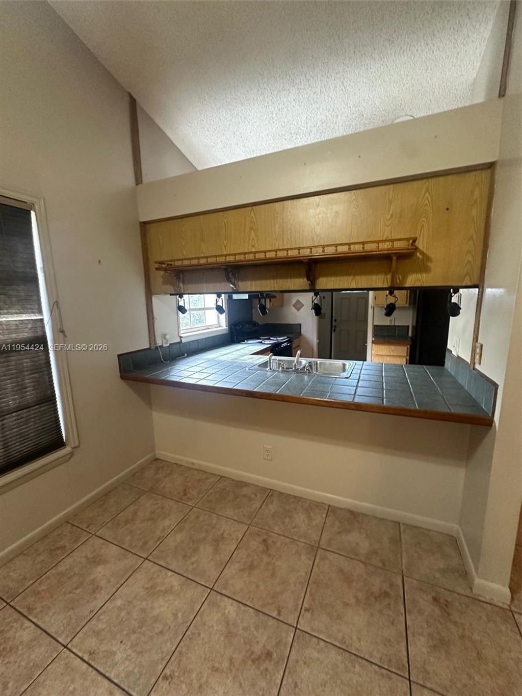 Photo of 1590 Royal Forest Ct, West Palm Beach, FL 33406 (MLS # A11954424)