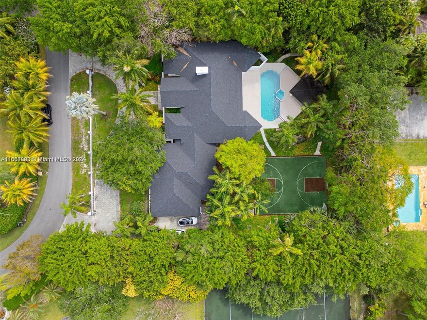 Welcome to North Pinecrest, where your dream home awaits you. This home features 7 bedrooms, 7.5 bathrooms. Upgraded in 2023 with all new Impact Windows and Doors, all new A/C Systems including Air Handlers and Ducts and New, frame off Roof replacement at a total cost of over $1,000,000. Additional features include: High Vaulted 16ft+ ceilings, Media play room, ample interior square footage on a 1-acre lot, Chefs Kitchen, Outdoor BBQ and cabana, and Lighted Basketball/Tennis court. A perfect, quiet  neighborhood for a perfect family, located within an A+ school district, with top prestigious schools such as Pinecrest Elementary, Gulliver, Palmetto, Ransom.  This Estate awaits a buyer to put their own touch to create their generational home.