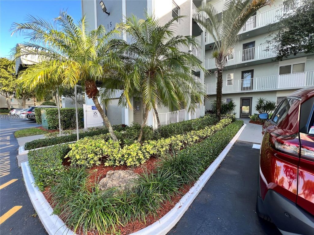 Photo of 2220 N Cypress Bend Dr #401, Pompano Beach, FL 33069 (MLS # A11783225)