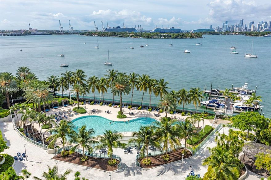 Enjoy breathtaking Biscayne Bay and Miami skyline views with stunning sunsets! This bright and spacious 2-bedroom, 2-bath home is ready for its new owner to experience resort-style living at Flamingo South Beach. Relax by two infinity pools, unwind at the poolside bar, or grab a bite at Pura Vida. The community also offers a state-of-the-art gym, salon, mini market, and doggy daycare. Pet-friendly and full of amenities this is South Beach living at its best!