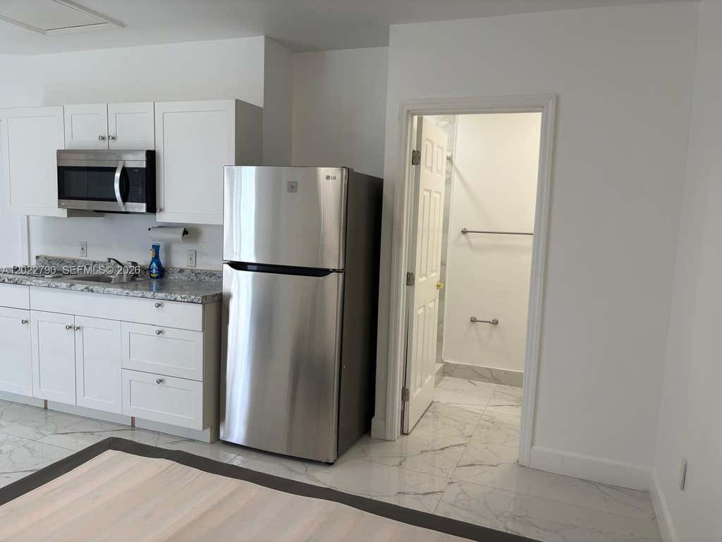 Photo of 2347 NW 107th Ave #B, Sunrise, FL 33322 (MLS # A12022790)