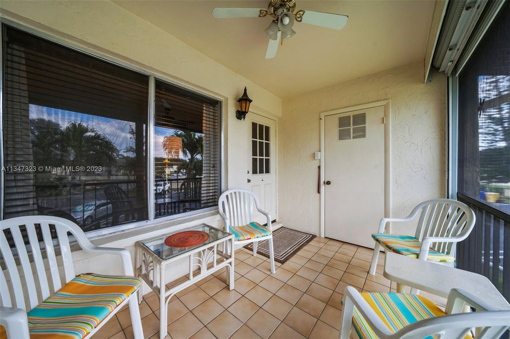 Photo of 301 Pine Ridge Cir #D-2, Green Acres, FL 33463 (MLS # A11347323)