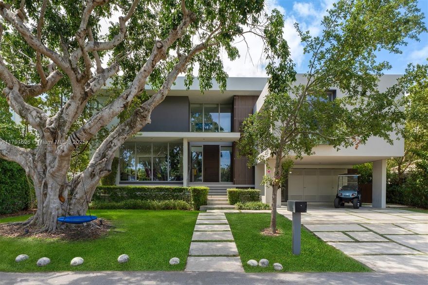 Built in 2020, this gorgeous residence is located on a quiet street on the exclusive paradise island of Key Biscayne. Designed with a sleek, modern, elegant and sophisticated open layout, this very comfortable home offers 6 spacious bedrooms and 5.5 beautiful bathrooms. Set on an 8,250 sq ft lot with 3,850 sq ft under A/C, it features soaring ceilings, exquisite high-end finishes throughout, and walls of glass that flood the interiors with natural light, creating a seamless blend of indoor and outdoor living. The expansive terrace, resort-style pool, and fully equipped summer kitchen offer the perfect backdrop for unforgettable gatherings surrounded by lush landscaping. A convenient carport and generous driveway parking make this home simply perfect.