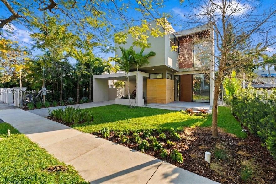 LOCATED IN THE ROADS, one of Miami’s most charming and tree-lined enclaves, this newly built residence invites you to experience a lifestyle defined by elegance, privacy, and effortless connection to the city. Just minutes from Key Biscayne, Brickell, Downtown, and Miami’s most vibrant destinations, it offers a rare sense of calm in the heart of it all.

Designed to inspire, the home unfolds with light-filled open spaces, soaring ceilings, and refined finishes that create a warm yet sophisticated atmosphere. Every corner has been thoughtfully curated to elevate everyday living while seamlessly accommodating unforgettable moments of entertaining.

The outdoor areas set the tone for true Miami living, featuring a modern-style pool and a custom oven, while the rooftop retreat with its private hot tub and skyline views offers a tranquil escape above the city.

Equipped with smart-home technology, premium appliances, spa-inspired bathrooms, and custom closets, the residence blends comfort with modern innovation. Set within a neighborhood known for its character, growth, and long-term value, this home is more than a property it is a place to live beautifully.