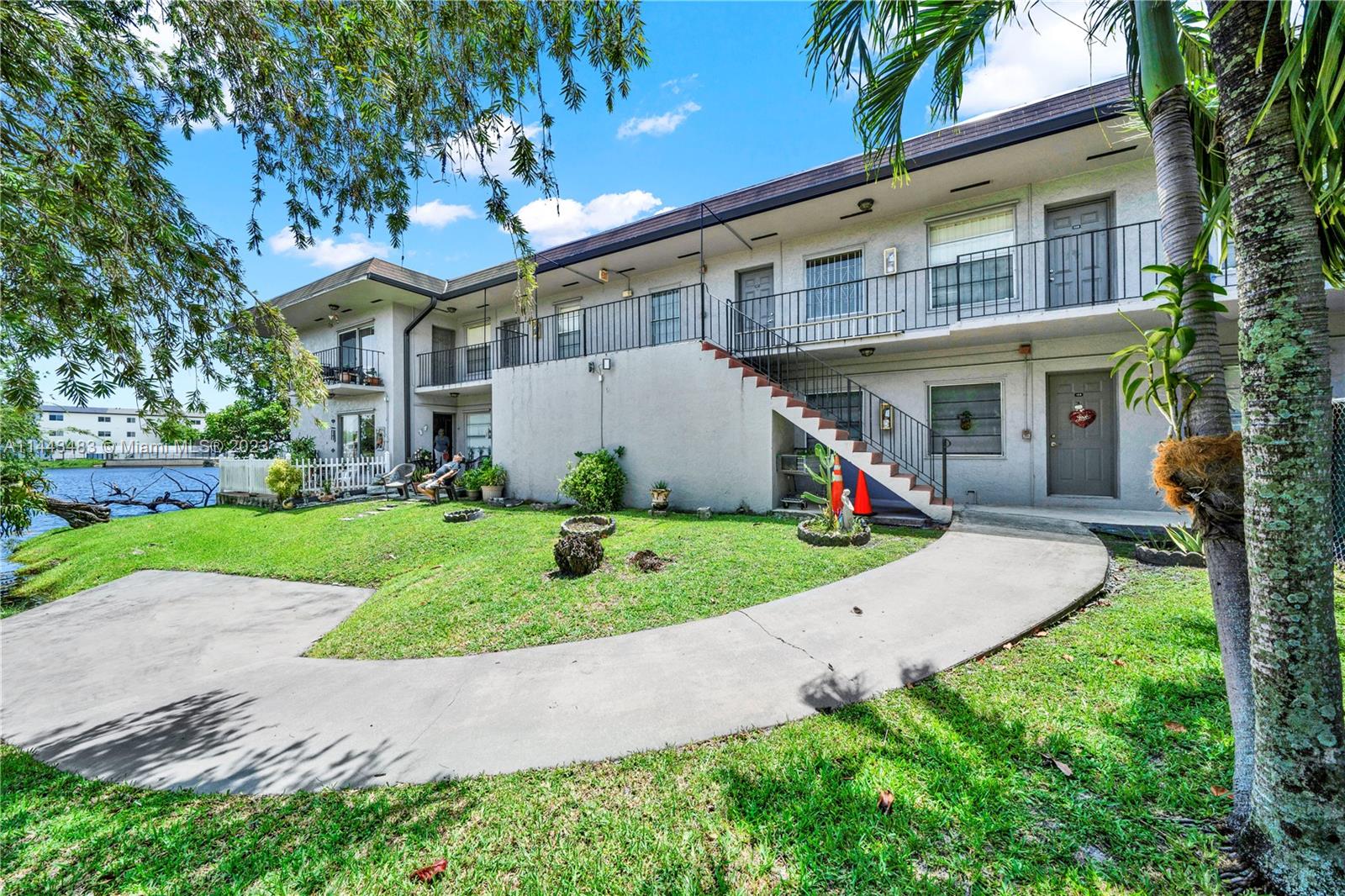 Location,location,location!!! Rare opportunity to own a mid-size Multi-family unit building in an excellent area of Hialeah-Miami Lakes. 14 one bedrooms and 4 two bedrooms make this great building a solid investment. The building has parking for 18 vehicles, plus plenty of street parking. It is also fenced and a lakefront property. Beautiful serene landscaping with lake view from the corridors. 4 corner units that have balconies. All units have tile floors, mostly all have newer remodeled kitchens and bathrooms. All with Central AC, Hurricane panel shutters except accordion on all of the 2 bedroom units. Laundry room area for extra income, passed 40 yr re-certification and now getting the 50 year. Owner offering financing with 25% down. Value-Add Opportunity