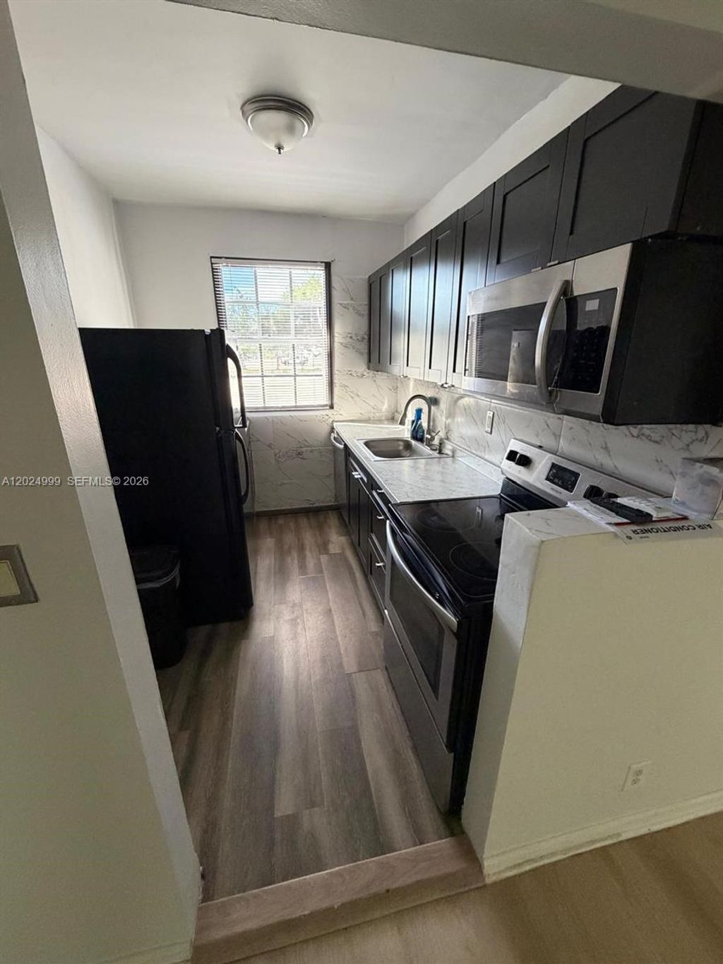 Photo of Hollywood, FL 33019 (MLS # A12024999)