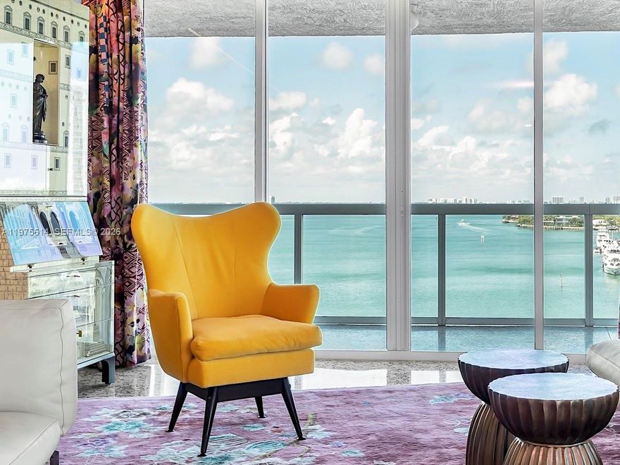 Welcome to the Grand Venetian, a boutique luxury building by renowned architect Kobi Karp perched on the waterfront of Belle Isle. You will love your new exceptionally walkable and bikeable Miami Beach neighborhood near Sunset Harbour and adjacent to Belle Isle Park, a shaded green oasis with walking paths, children's playgrounds and dog parks.

Unit 904, located in the building’s most coveted northeast corner, features an expansive wraparound balcony accessible from every room with panoramic views of Biscayne Bay, Miami and Miami Beach skylines. The no expense spared renovation features Boffi cabinetry and fixtures in the kitchen and bathrooms, Miele appliances with a retractable cooktop vent and a smart home system with Lutron lighting, automatic blinds, hardwired Wi-Fi with extenders, Sonos and Nest systems and two wall mounted Sony televisions. The primary suite is a spa like sanctuary with a large soaking tub and slab marble steam shower both with sweeping bay views. The bathrooms include Toto smart toilets and all closet systems contain custom Poliform shelving. Included with 904 are two parking spaces - one designated and one valet.

The building has on-site management and collects full reserves with extremely solid financials. The top-tier amenities encompass a full-time doorman, free valet parking for guests, bayside state-of-the-art fitness center, pool, hot tub, outdoor kitchen, tennis court and private bay access.

Be sure to check out the virtual tour.