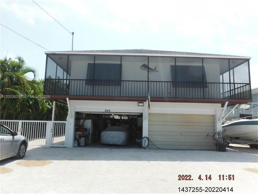 Beautiful 4/2 Home with 90FT Concrete Dock for your vessel, and the canal is 200 ft wide with Ocean access, pool, impact windows, and much more upgrades, IN Marathon Key.