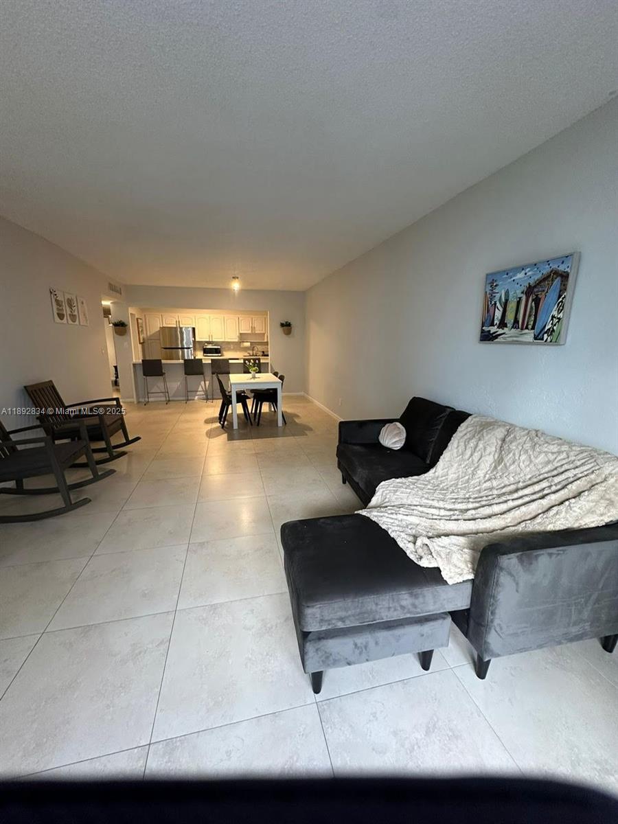 REDUCED!!!Completely Renovated 1 bed/ 1 bath Furnished Unit. New Porcelain Floor, New Open Kitchen With Stainless Steel Appliances And White Quartz Countertop. 3 Walking Closets. Cable and Internet Included. Covered Parking. Full Service Building in Great Location.