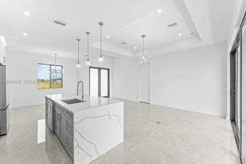 Tiny photo for 1433 NW 7th Pl, Other, FL 33993 (MLS # A12006542)