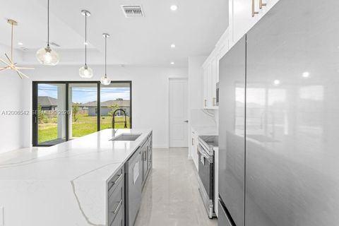 Tiny photo for 1433 NW 7th Pl, Other, FL 33993 (MLS # A12006542)