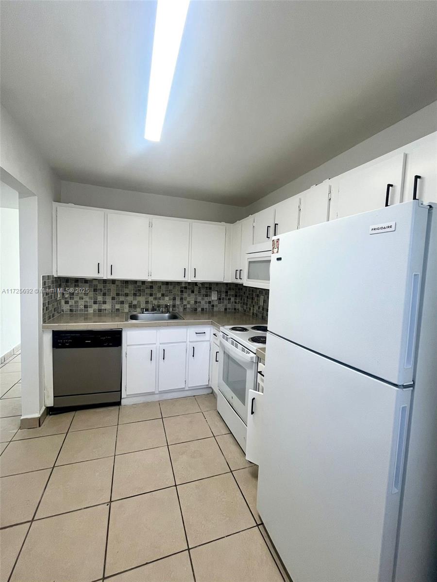 BEST DEAL ALMOST ANYWHERE ESPECIALLY IN AN AREA ONLY 1 MINUTE FROM AVENTURA!! GREAT FOR INVESTOR OR END USER. NICE & LARGE 3/2 WITH VERY LOW MAINTENANCE FEES. UNIT HAS WALK IN CLOSET, BALCONY, AND WASHER/DRYER. SAFE GATED COMMUNITY WITH 2 POOLS. UNITS CAN BE RENTED $2400 TO $2600 A MONTH AND IF RENTED TO SECTION 8 CAN GET BETWEEN $2600-$2900 A MONTH. CENTRALLY LOCATED BETWEEN FT. LAUDERDALE,SOUTH BEACH, AND DOWNTOWN MIAMI. NEAR ALL MAJOR ROADS, GREAT SCHOOLS, AND ANYTHING ELSE YOU NEED.UNIT IS NICER THEN THE PHOTOS IF YOU CAN IGNORE THE CLUTTER.