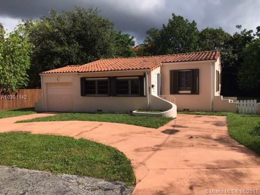 2 bedrooms and 1 bath plus 1 car garage on 11,560 q.ft of land. Accordion shutters. This 1940's home is ready to be brought into the 21st Century. Room for an addition and/or a pool. This home is Centrally located in charming  Biscayne park on a serene tree lined street within walking distance to the Park.
This home needs loving TLC  ,fireplace, large yard, garage. Lots of space for additions.It is sold in AS IS condition without repairs or warranty. Buyer is responsible for verifying all information contained in this listing.
Vacant .