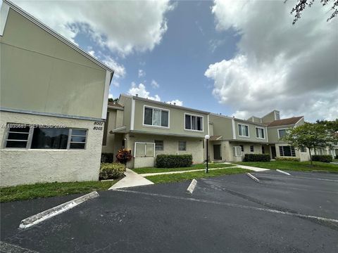 Photo of 8005 Lagos De Campo Blvd #L-4, Tamarac, FL 33321 (MLS # A11993487)
