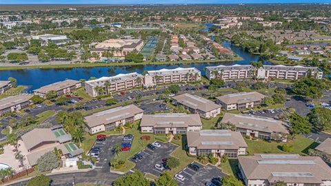 Photo of 9994 N Belfort Cir #210, Tamarac, FL 33321 (MLS # A12044351)