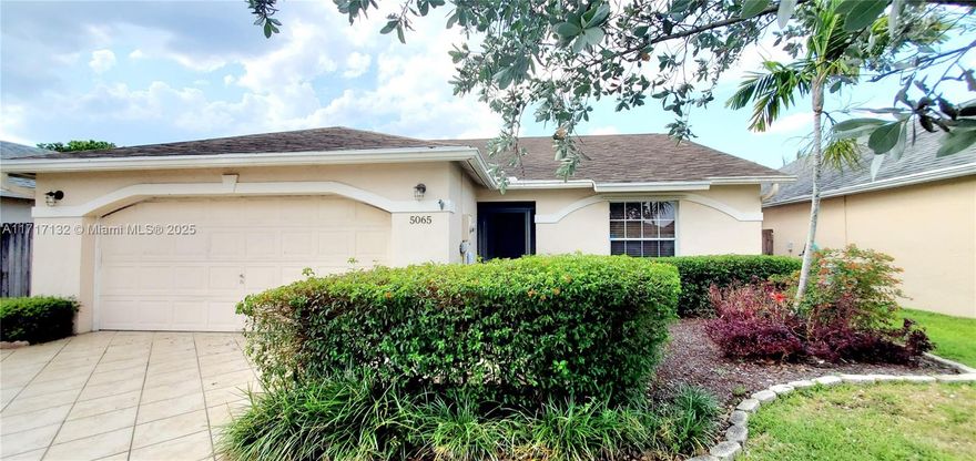 Spacious Single Family Home in Gated Foxhall Community! Beautifully Renovated 2 Bedroom & 2 Bathroom Home with an Oversized 2 Car Garage! Mahogany Wood Floors in the Living Room, Travertine Stone in the Master Bedroom & Bathroom* Porcelain Tile Throughout* Large Walk-In Closet Space* Vaulted Ceilings* Many Upgrades Throughout Including Newer Stainless Steel Appliances* Crown Molding* Open Spacious Floor Plan with a Separate Dining Area for a Breakfast Table* Covered / Screened Porch with Fully Fenced-In Private Backyard with Brick Paver Patio* Basic Cable & Internet Included In Low HOA* The Community Offers a Cabana / Swimming Pool Facility and Children's Playground* Conveniently Located near the New Palm Beach Outlet Mall and Airport.