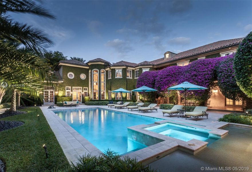 Gorgeous 6Bed/7+2 Bath 10,401 SF residence in Ponce Davis area is a perfect blend of stunning architecture and state-of-the-art finishes. The foyer with floor-to-ceiling windows leads to sophisticated living areas and office with fireplace. The interior features high-end kitchen with black marble island, custom wine cellar, and media room. The master bedroom offers his/her spacious walk-in closets, and a marble bathroom with whirlpool bathtub and custom vanities. Outdoors, there is a cabana with summer kitchen and sound system, and a pool/spa with custom lighting. All are surrounded by landscaped gardens. Home also comes with a gym, maid’s room, smart-house system, elevator, full house generator, security cameras, a main 2-car garage, and additional 1-car garage, both air-conditioned.