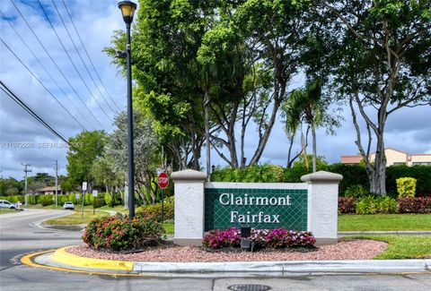 Photo of 10975 W Clairmont Cir #207, Tamarac, FL 33321 (MLS # A11972228)