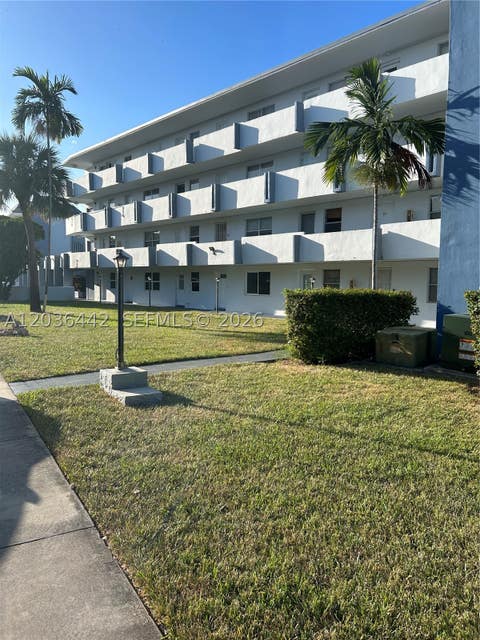 Photo of 1101 NE 191st St #H401, Miami, FL 33179 (MLS # A12036442)