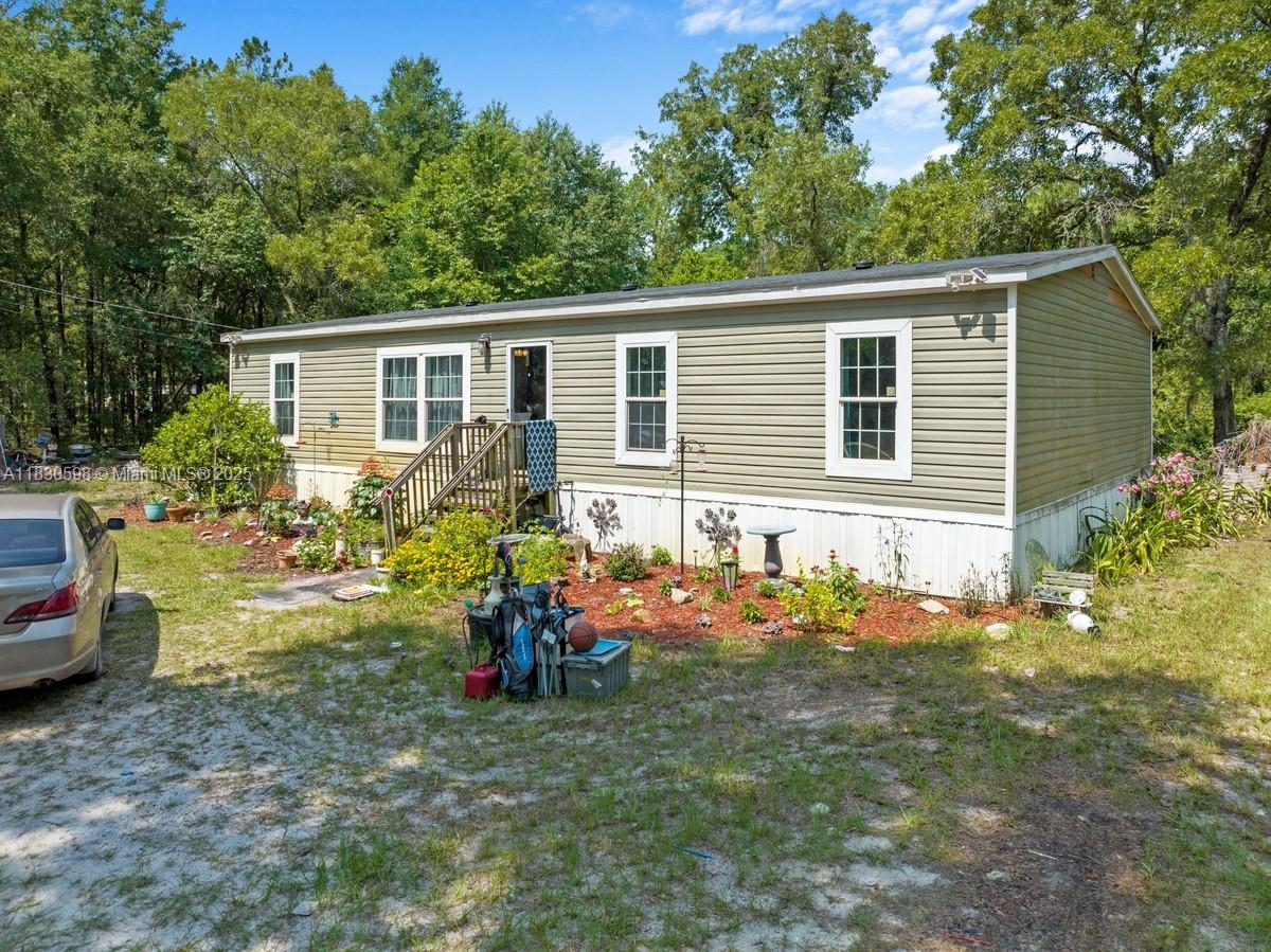 DISCOVER COMFORT, SPACE, AND TRANQUILITY IN THIS BEAUTIFUL MAINTAINED 4 BED / 2 BATH MOBILE HOME W/1664 SQ.FT OF LIVING SPACE. NESTLED IN THE HEART OF MIDDLEBURG. THOUGHTFULLY DESIGNED WITH BOTH FUNCTIONALITY AND CHARM, THIS HOME OFFERS AN OPEN FLOOR PLAN, A GENEROUSLY SIZED KITCHEN AND AN INVITING LIVING AREA PERFECT FOR ENTERING OR RELAXING. STEP OUTSIDE TO ENJOY PEACEFUL COUNTRY LIVING WITH PLENTY OF ROOM TO GARDEN, PLAY, OR SIMPLY TO TAKE IN THE BEAUTIFUL OUTDOORS. WHETHER YOU'RE LOOKING FOR YOUR FOREVER HOME OR A PEACEFUL ESCAPE WITH ROOM TO GROW, THIS MIDDLEBURG GEM OFFERS ENDLESS POTENTIAL.