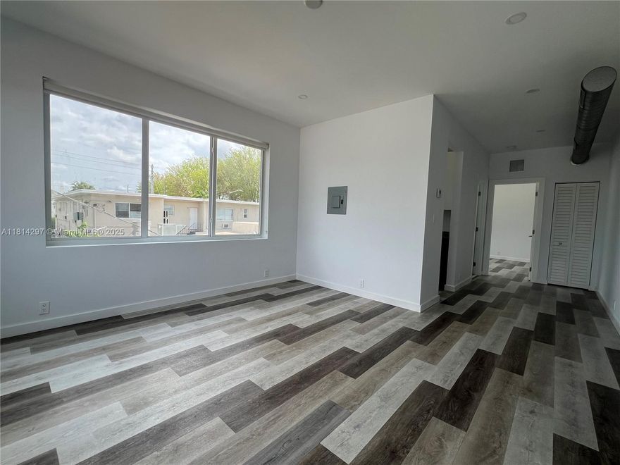 Amazing gem of a unit in the heart of Shenandoah has been renovated from top to bottom including new roof, electrical, plumbing and impact windows and doors. All of the building's interior is completely brand new with a modern design and attention to every detail. Each of the 1 bed/1 bath units feature high ceilings (9 ft), an open living area, custom closets in the bedroom and a wifi app based washer/dryer inside the building. The kitchens are equipped with wood cabinets, quartz countertops and stainless steel appliances including a built-in microwave. Off-street parking across the beautifully remodeled Shenandoah Park! Professionally managed with full maintenance staff. With approved application we will ONLY require First Month & Security Deposit. Section 8 welcome.