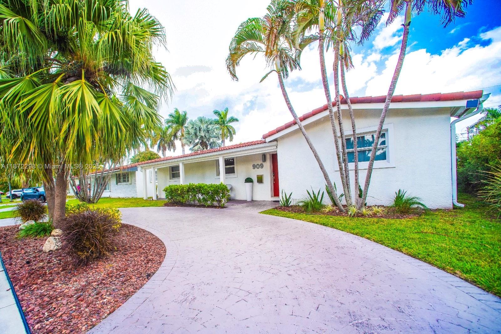 Luxury & income property - Steps to the beach in Hollywood Lakes! Beautifully remodeled single-family residence in highly desirable Hollywood Lakes, offering a rare 2,350sf of living space. Spacious open layout with modern kitchen, large master suite with en-suite bath, walk-in closets & bedrooms overlooking the pool. Enjoy the private backyard oasis with a covered patio and pool - perfect for year-round entertaining, rain or shine. The entire property has been fully renovated with all permits up to date, providing peace of mind & true turnkey living. Proven $100K+ annual rental income with active seasonal rental license - all licenses & permits up to date, no surprises! Prime location just minutes from the beach, Hollywood Broadwalk, golf, nature parks, dinning, shopping and FLL Airport.