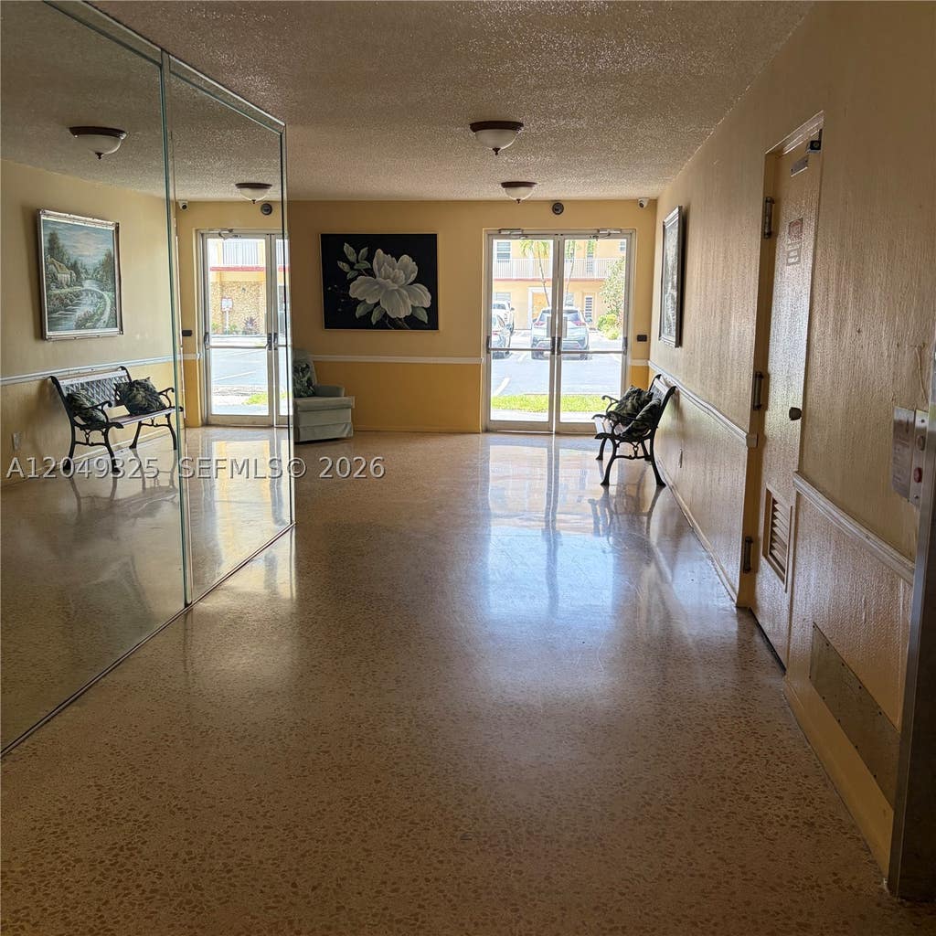 Photo of 3940 NW 42nd Ave #313, Lauderdale Lakes, FL 33319 (MLS # A12049325)