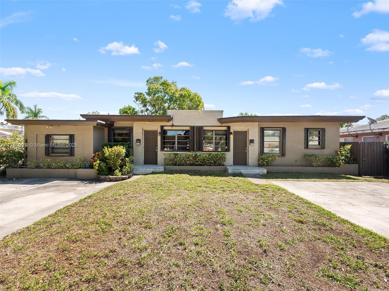 Very rare duplex with over 2,000 sq.ft of living area. Tons of flexibility with 5 beds 2 baths. Lots of closet space. Currently separated as a 3/1 and 2/1. Can be combined to one large home. Laundry for each unit. Separate meters. Newer Roof! New flooring. Central A/Cs. Huge backyard with great storage sheds for each side. Two separate driveways, lots of parking. Popular area for vacation rentals as the property is east of Dixie Hwy and minutes to the beach. Very large 8,583 sq.ft lot with multifamily zoning for up to 10 units. Property delivered vacant at closing. High development area with a lot of new restaurants/residential buildings. Recently rented for a total of $5200/month. Seller financing option at 40% or more down.