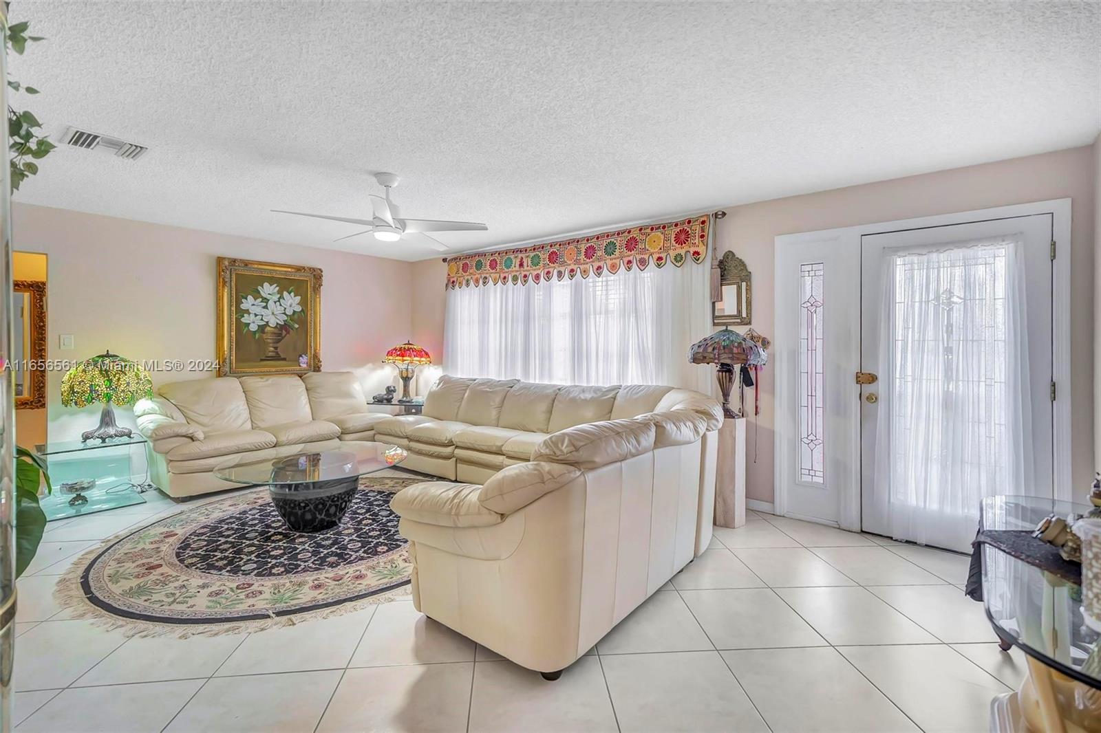 Charming 2-bedroom, 2-bath home located in 55+ community offers a comfortable & functional layout. Enter into a spacious living room that flows into a dining area, perfect for gatherings & everyday living. The well-equipped kitchen, which includes a breakfast nook, provides plenty of counter space and storage for culinary needs. The master bedroom features a walk-in closet & an en-suite bathroom for added privacy, while the second bedroom is conveniently located near a full bathroom. The home also includes a cozy family room for relaxation & an attached garage offering ample storage & parking space. Additional features include a washer, dryer, stove, and fridge, w furniture negotiable. This home’s open layout and thoughtful design make it ideal for comfortable living.