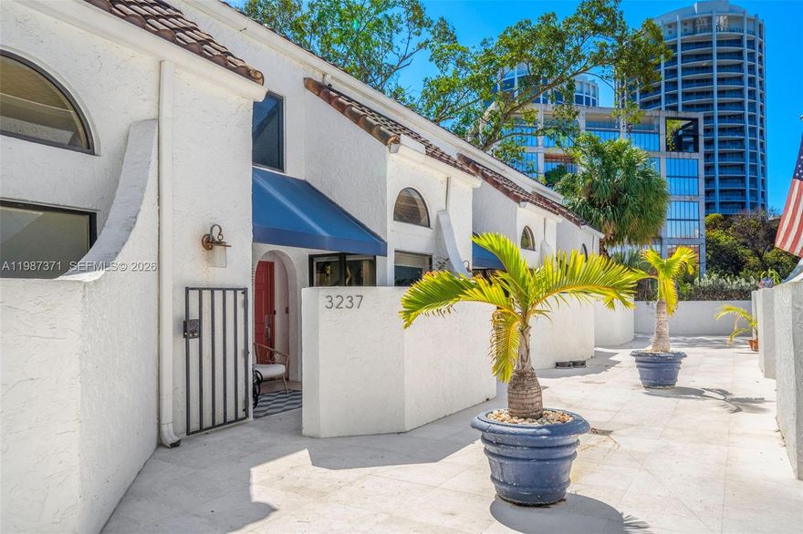 Live, Work, Play in one of the most desired locations in the country. HEART of Coconut Grove! Just steps to Cocowalk, Grove Sailing Club, Peacock Park, and many of the highest rated dining, shopping and entertainment destinations in all of Miami. This is a one of a kind, magazine quality, multi-level, open floor plan townhouse. 2 bedroom, 2.5 bathrooms + upstairs loft/office. All impact windows and doors. Kitchen and bathrooms updated. This townhouse is part of a low rise community, entering through a private courtyard, with vaulted ceilings, open spaces, french doors, and lots of light. All year entertaining and outdoor living with your private, outdoor patio. Complete with a privacy wall, guaranteeing serenity night and day. Two assigned, covered, inside parking spaces. Seperate laundry room, and additional storage in parking garage. Bottom line, this is a modern, super sleek, slightly funky, just really cool townhouse! So leave the car in the garage, and enjoy everything Coconut Grove has to offer.
Call or text me anytime to view. I'm fortunate enough to live and work just down the street.