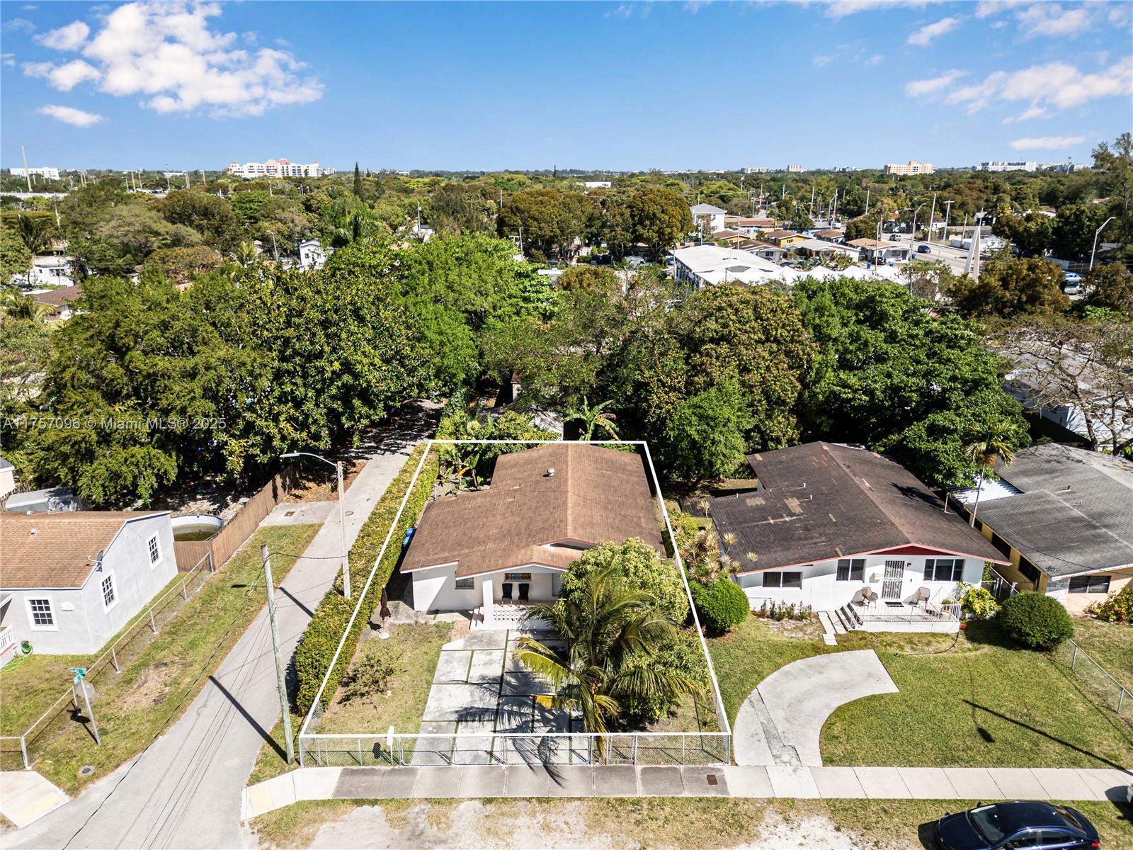 Discover an incredible opportunity to own a stunning 3-bedroom, 2-bathroom single-family home located in one of Miami’s fastest-growing neighborhoods! Situated on a prime corner lot, this home offers unmatched convenience, just minutes from Downtown Miami, the beaches, Midtown, the Design District, and Wynwood. With easy access to major highways, commuting is effortless. This home also features a versatile additional space—perfect for a home office, den, or a private studio with its own separate side entrance. Don't miss out on this incredible opportunity—schedule your showing today!