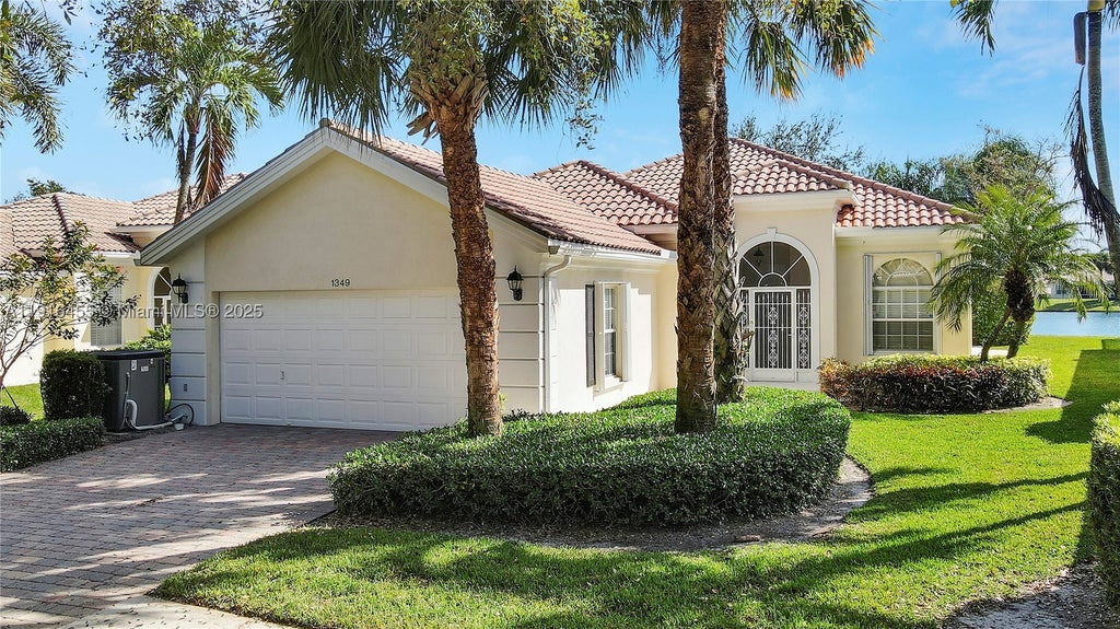 Photo of 1349 Saint Lawrence Dr, Palm Beach Gardens, FL 33410 (MLS # A11916455)