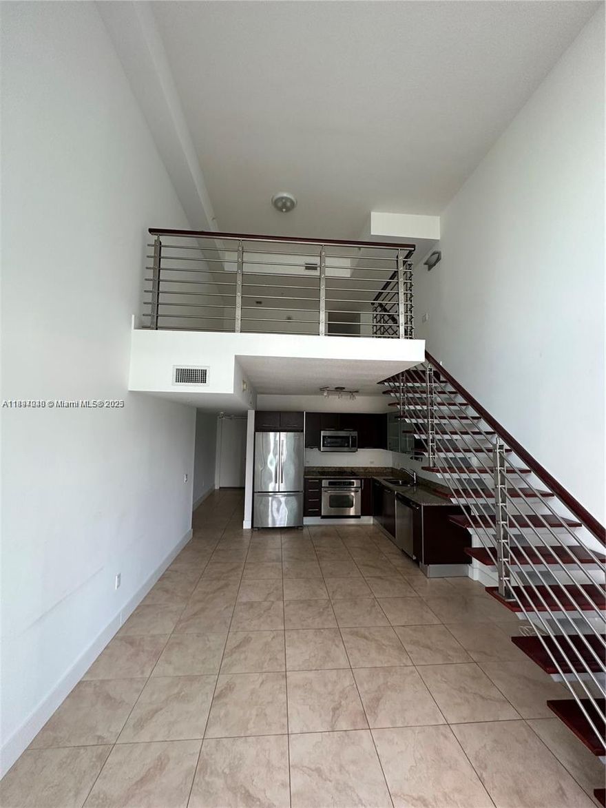 Experience the best of Miami living in this stunning two-story loft perched on the 16th floor of Brickell on the River. With double-height ceilings and floor-to-ceiling windows, this residence is filled with natural light and offers spectacular city views. Living area has a convenient guest powder room on the main level. Upstairs, the primary suite provides a private retreat with a full bathroom and in-unit washer and dryer.
Enjoy world-class amenities, including two sparkling pools, a state-of-the-art fitness center, spa, valet, and more. Step outside and immerse yourself in the vibrant Brickell lifestyle.