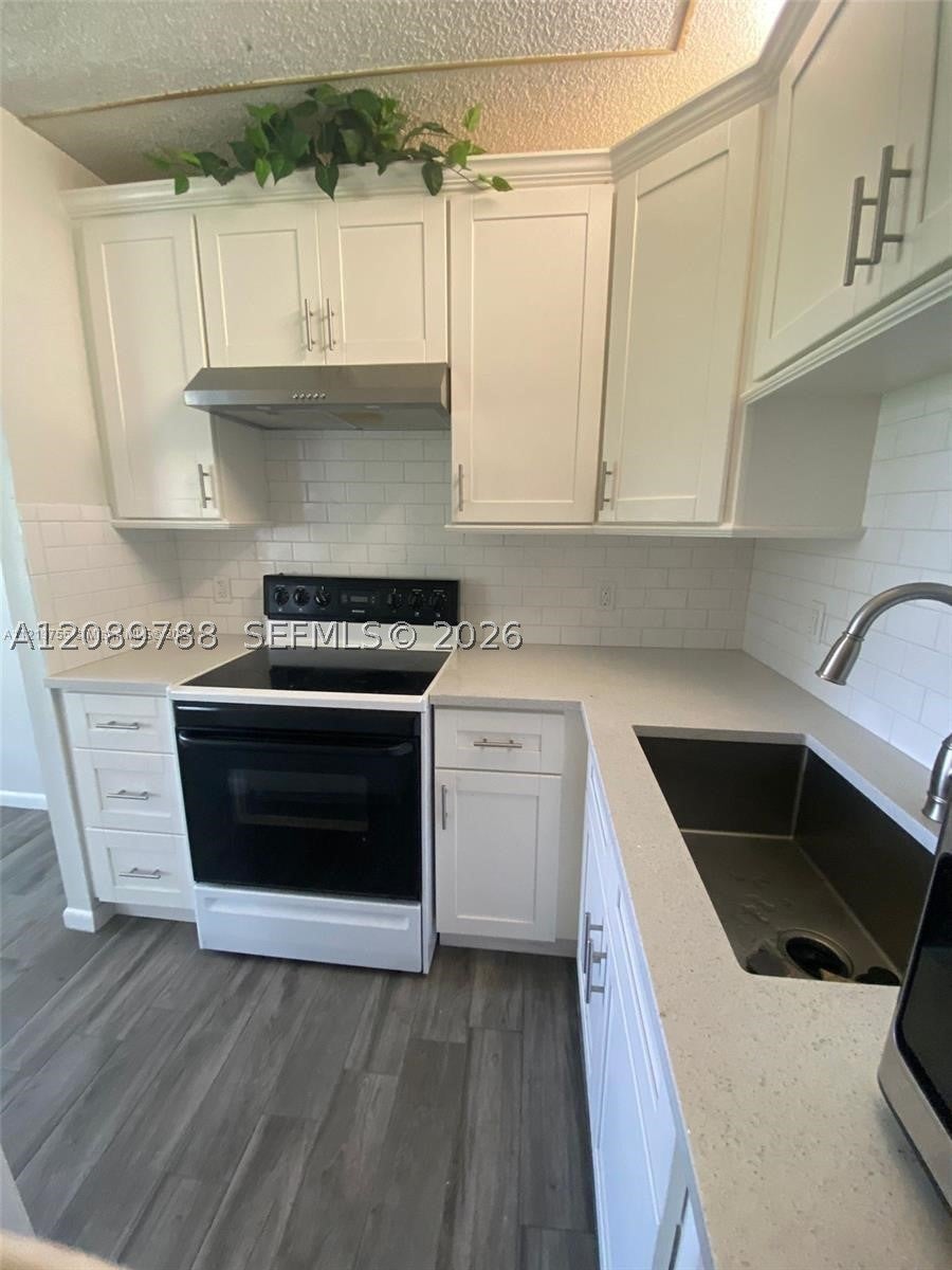 Photo of 22 SE 3rd Ter #24, Dania Beach, FL 33004 (MLS # A12089788)