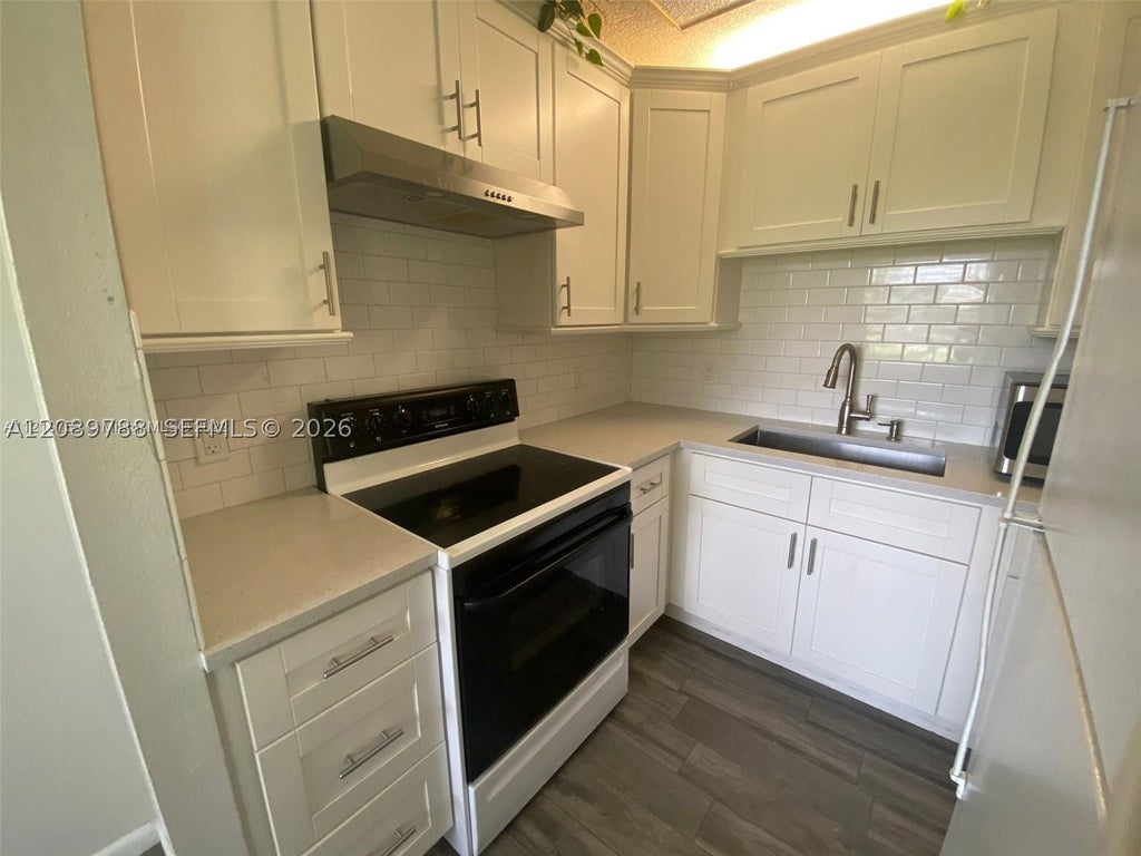 Photo of 22 SE 3rd Ter #24, Dania Beach, FL 33004 (MLS # A12089788)