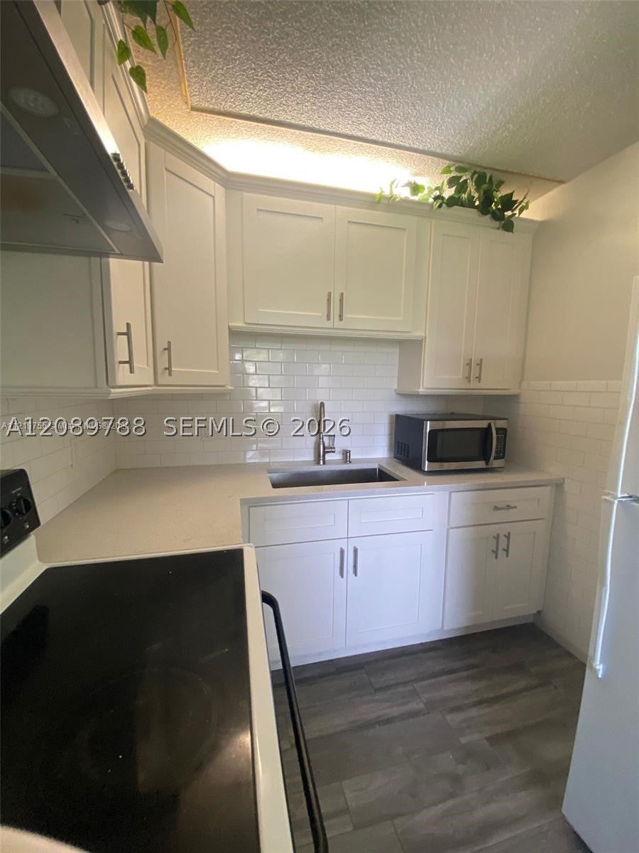 Photo of 22 SE 3rd Ter #24, Dania Beach, FL 33004 (MLS # A12089788)