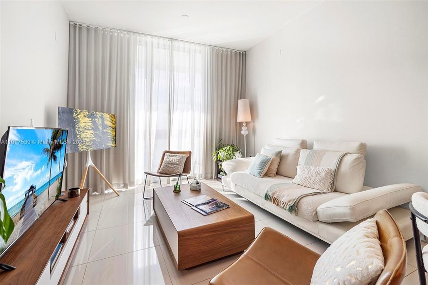 Expansive high-rise condo offering breathtaking water views and a bright, open layout now available for lease in the coveted gem of North Bay Village. This stunning unit includes a versatile second room that could be used as a second bedroom, den, nursery, or office. Enjoy elegant finishes throughout, a private balcony, and a tranquil island atmosphere-perfect for those seeking luxury living with unbeatable convenience. Experience modern living, resort-style amenities, and a serene coastal oasis just minutes from Miami's best dining, beaches, and nightlife.