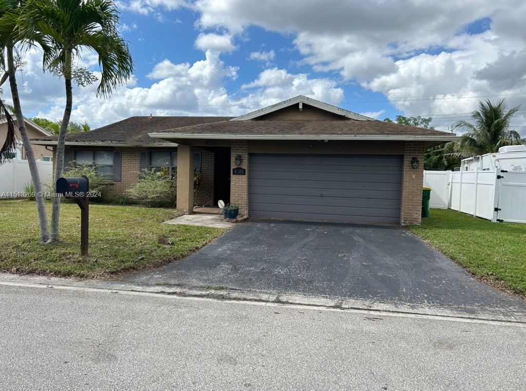 Photo of 9701 NW 83rd St, Tamarac, FL 33321 (MLS # A11513269)