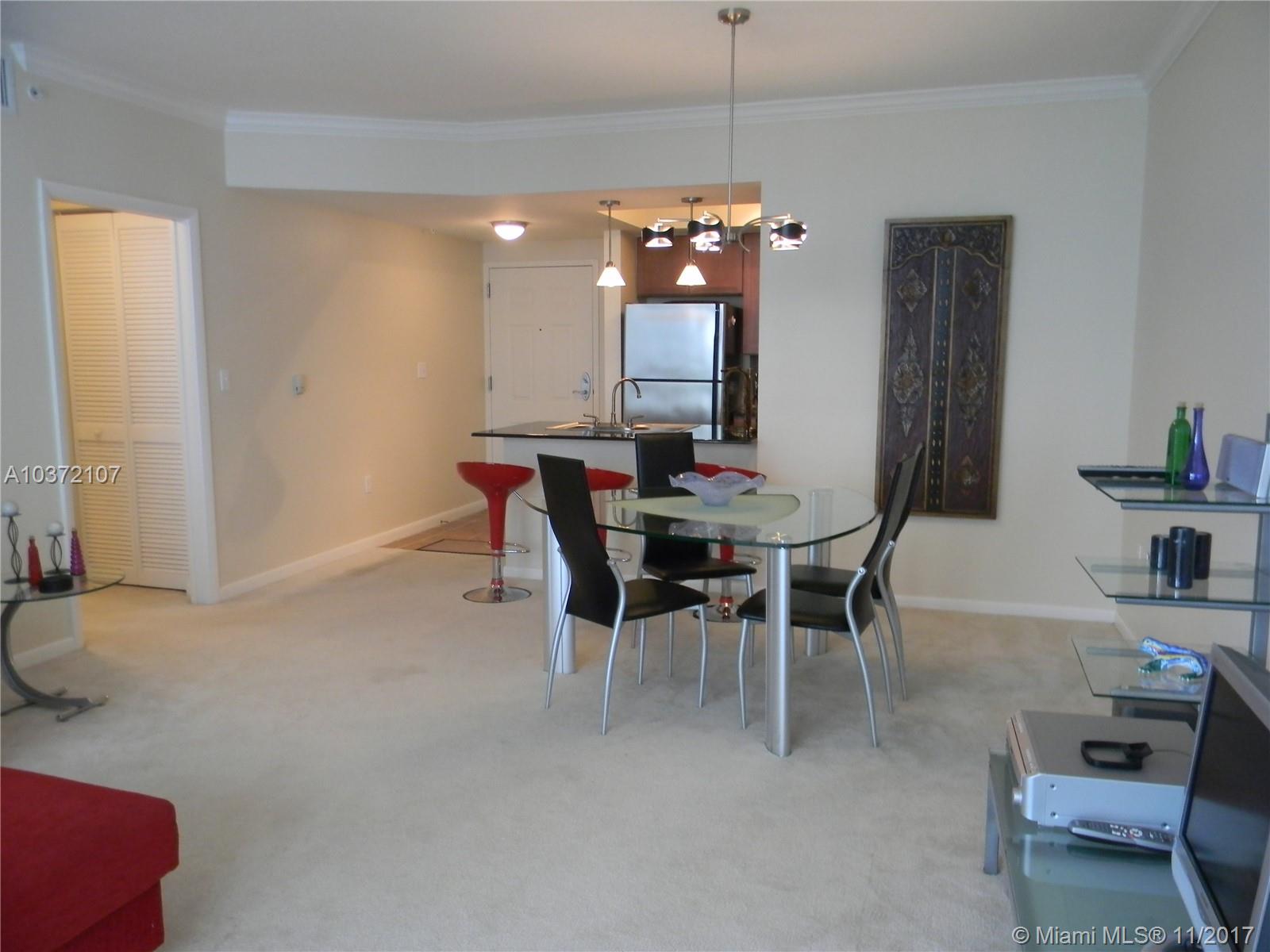 **Rent includes basic cable & internet**Fully furnished large 1/1 condo**New Tiles currently being installed in living-dining areas and bedroom**Unit 525 features the largest 1 BR floorplan at CITE, overlooking the resort-style pool and palm gardens**W/D in unit. 1 parking space incl in rent. CITE is a full-service condo offering 24/7 front desk, valet, security and tranquil amenities such as beach-style-pool, jacuzzi, large TechnoGym open daily 6am-11pm, club room w/pool billiard, business-lounge w/free internet 24/7. Fine retail on premises. Walk to shopping, dining, public transportation. Close proximity to Downtown, Brickell, beaches, airport, hospitals and all major highways.