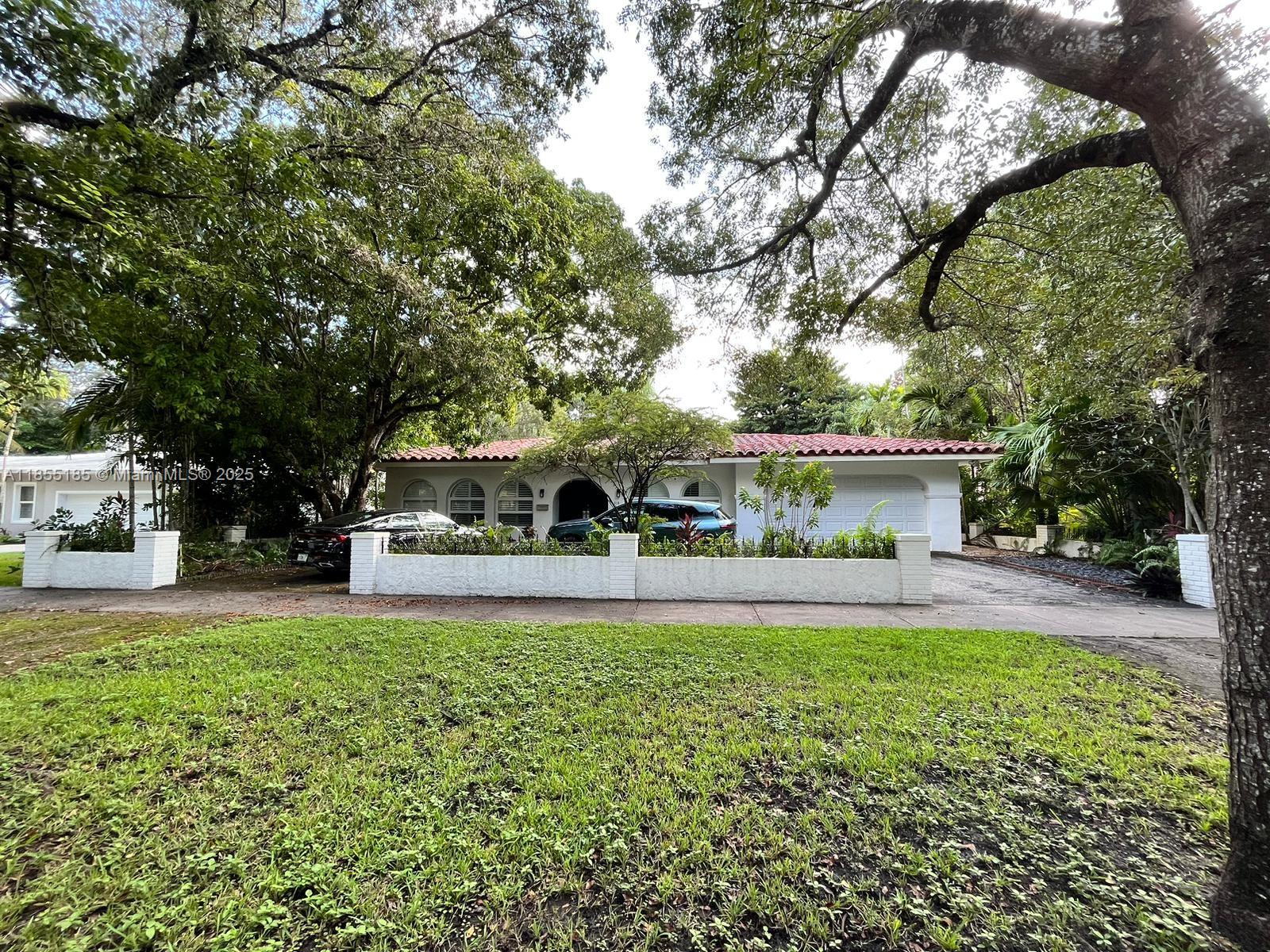 Welcome to this charming and elegant single-family home located in the heart of Coral Gables, just steps away from the iconic Biltmore Hotel and golf course. This elegant residence features 3 bedrooms and 3 bathrooms, a spacious layout with abundant natural light, and a private backyard perfect for relaxing or entertaining. Interior highlights include a modern kitchen with stainless steel appliances and granite countertops, updated bathrooms, 2 New central A/C unit. New impact window and Door. Master Bedroom with walk -in closet and additional closet and Master bathroom with tub and shower, 2nd bath with tub and 3rd bathroom with shower. All new updated lighting. Double car Garage and Circular driveway allows for parking several cars.