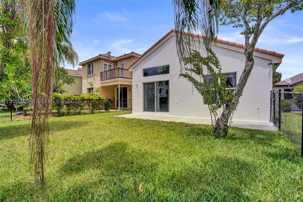 Photo of 5272 NW 117th Ave, Coral Springs, FL 33076 (MLS # A12032039)